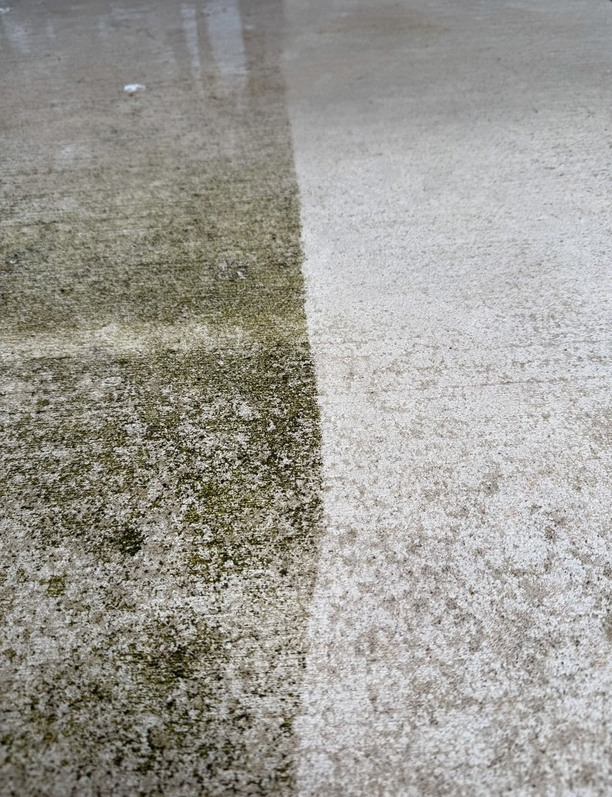Orbit Soft Wash surface cleaning equipment in use on concrete