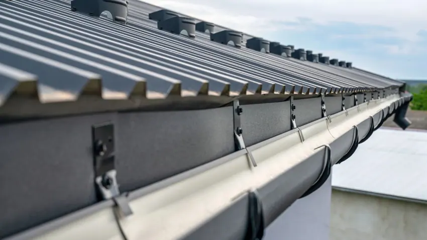 Commercial building metal roof gutter