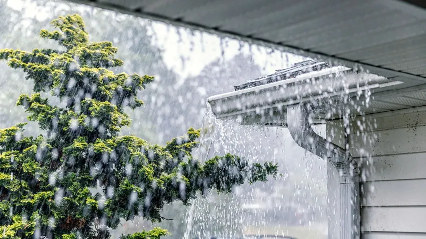 Rainwater overflowing from gutter
