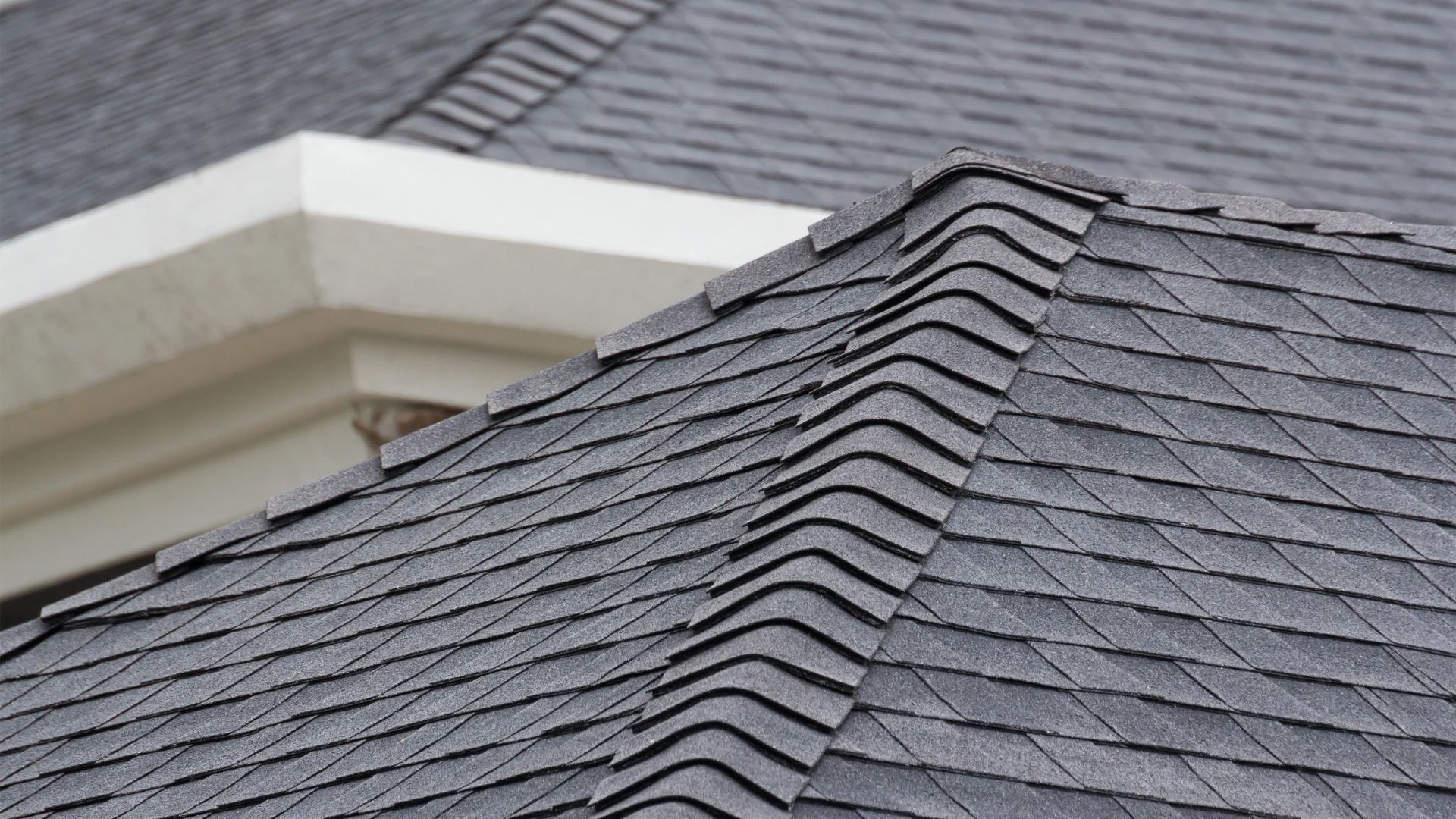 Residential roof after exterior soft washing by Orbit Soft Wash